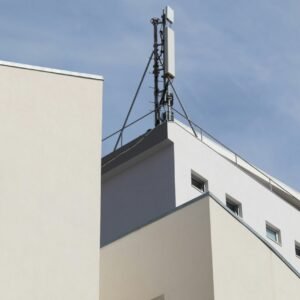 A tall building with a clock on the side of it